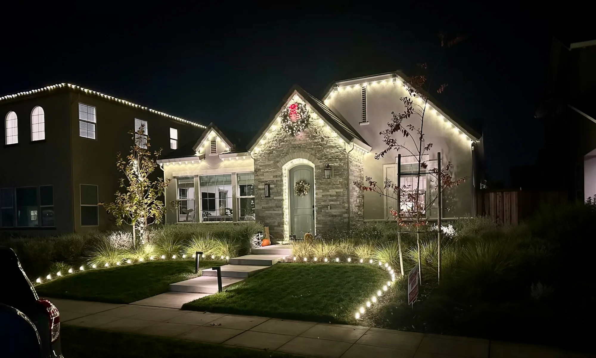Professional Christmas light installation on a Sacramento home roofline