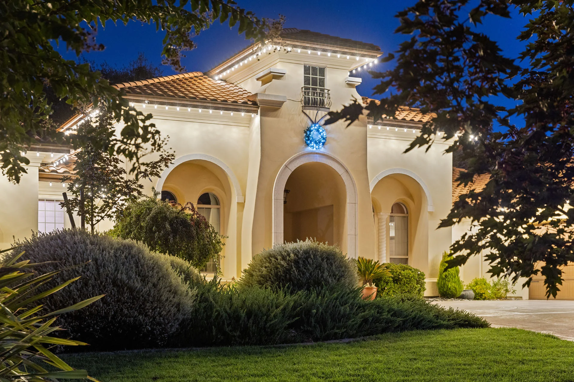Large multi-story Sacramento home requiring scaffolding for Christmas light installation
