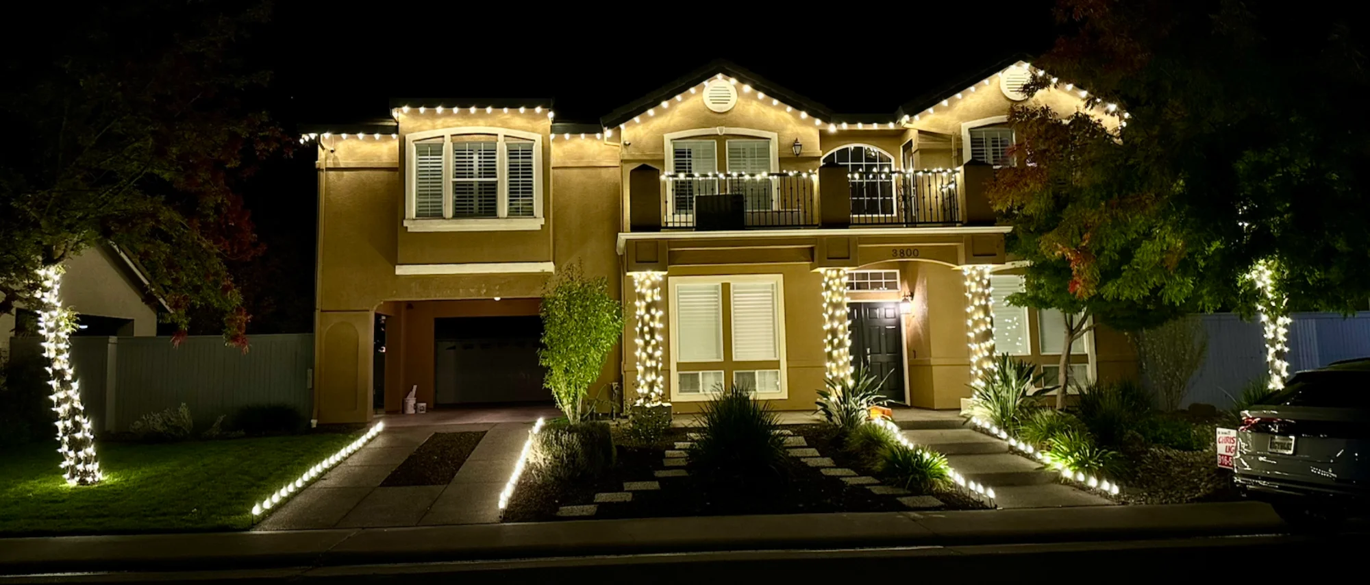 Warm white Christmas light display on a Sacramento home, 2026 trend
