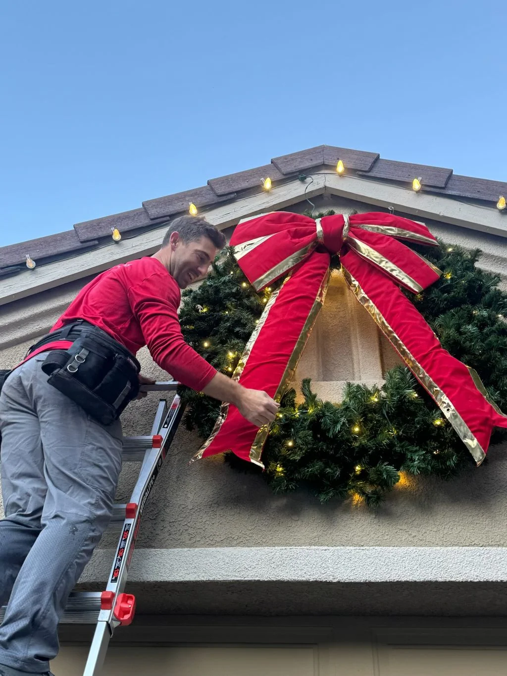 Santa's Lights crew replacing an old incandescent light display with LED in Sacramento