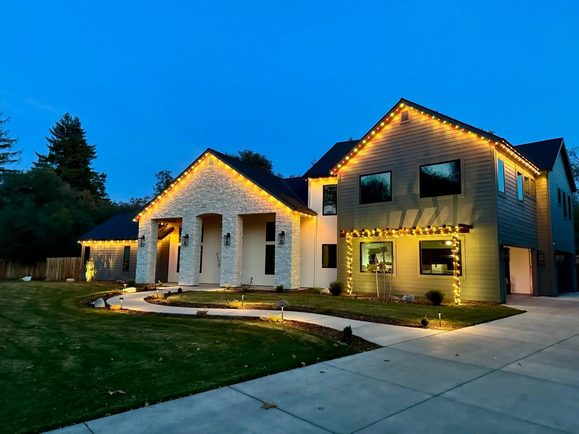 Sacramento home with LED Christmas lights lit up at night