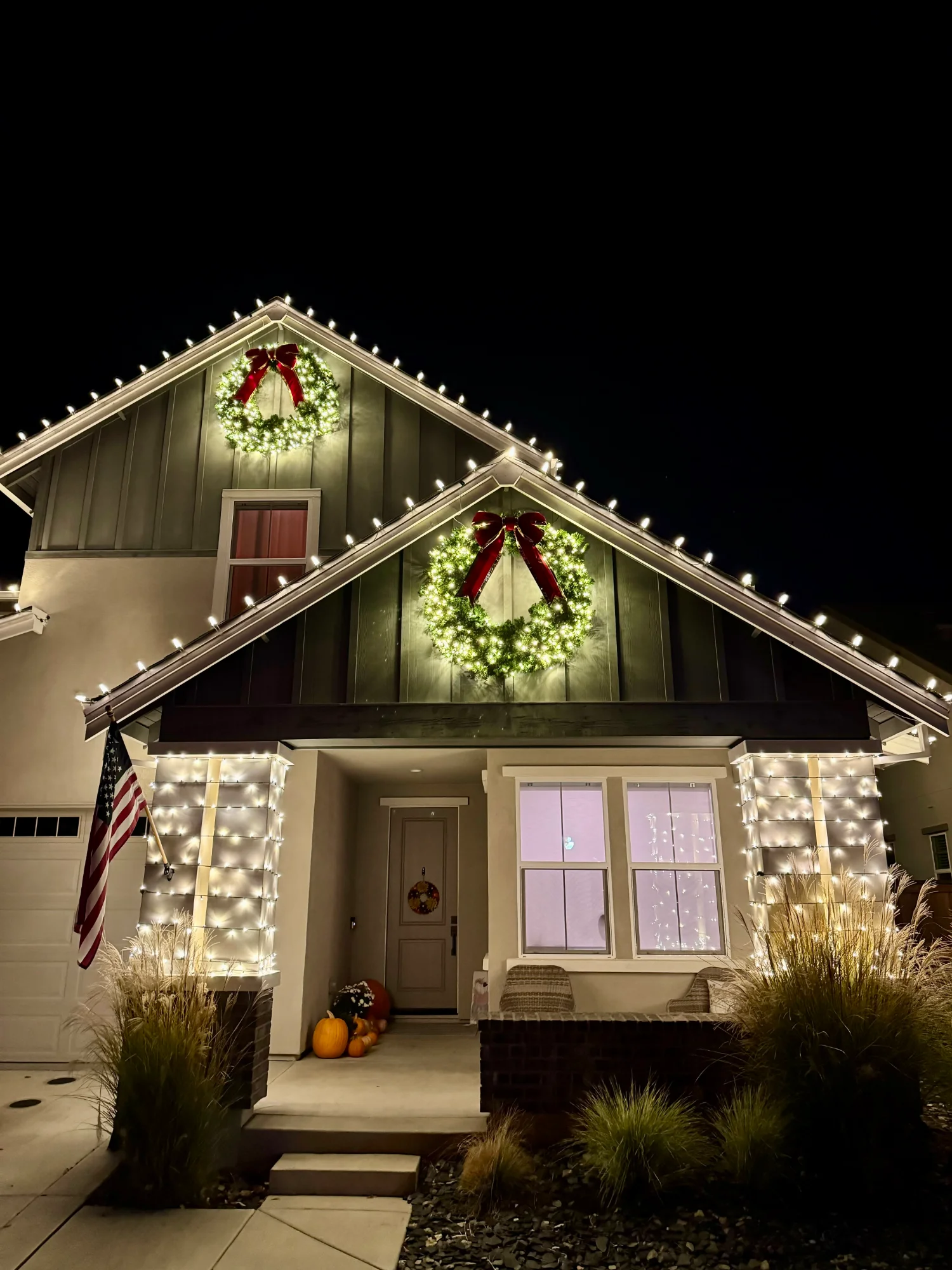 Wreath and religious holiday decorations on a Sacramento home entry door